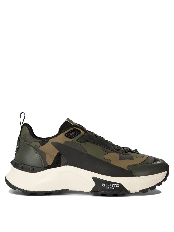 Athletic shoes with bright neon colors -VALENTINO GARAVANI True Act Camouflage Low Top Sneakers